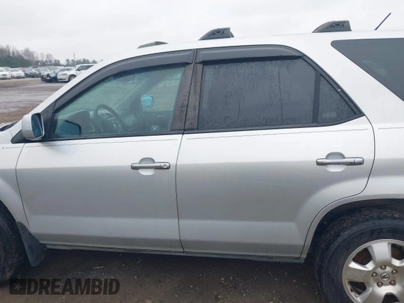 2004 Acura MDX with VIN 2HNYD18244H541101, listed as a IAAI auction lot 41211015 with 226,112 mi miles. Bid and sale history available at carsss.com. Image 14.