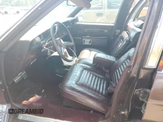 1987 Chevrolet Caprice z VIN 1G1BU51H7H9156079, wystawiony jako Copart lot #60443124 z przebiegiem 44 452 mil mil oraz Szkoda całkowita • Salvage title. Historia ofert i sprzedaży dostępna na DreamBid. Obrazek 7.