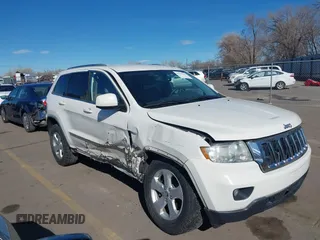 2011 Jeep Grand Cherokee Laredo z VIN 1J4RR4GG2BC714456, wystawiony jako IAAI lot #41859733 z przebiegiem 146 877 mil mil oraz . Historia ofert i sprzedaży dostępna na DreamBid. Obrazek 1.
