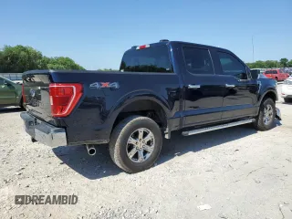 2021 Ford F-150 XL with VIN 1FTFW1E5XMFA47980, listed as a Copart auction lot 56737215 with 63,781 mi miles and Salvage title. Bid and sale history available at DreamBid. Image 3.