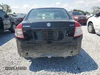 2009 Suzuki SX4 Sport FWD z VIN JS2YC414796203079, wystawiony jako Copart lot #57280845 z przebiegiem 170 213 mil mil oraz Szkody całkowita. Historia ofert i sprzedaży dostępna na DreamBid. Obrazek 6.