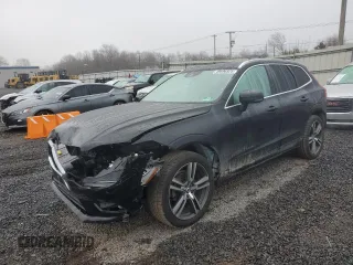 2018 Volvo XC60 Momentum with VIN LYV102RK1JB087884, listed as a Copart auction lot 49696925 with 34,601 mi miles and Salvage Title. Bid and sale history available at carsss.com. Image 1.