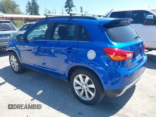 2015 Mitsubishi Outlander GT with VIN 4A4AR4AWXFE047335, listed as a IAAI auction lot 42720990 with 164,672 mi miles and . Bid and sale history available at DreamBid. Image 3.