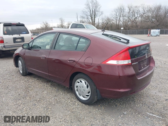 2011 Honda Insight LX z VIN JHMZE2H52BS004304, wystawiony jako IAAI lot #41827541 z przebiegiem 141 072 mil mil oraz . Historia ofert i sprzedaży dostępna na DreamBid. Obrazek 3.