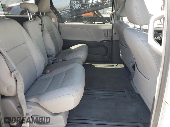 2015 Toyota Sienna XLE with VIN 5TDYK3DC1FS690219, listed as a Copart auction lot 60926525 with 97,879 mi miles and Salvage title. Bid and sale history available at DreamBid. Image 11.