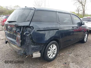 2017 Kia Sedona LX with VIN KNDMB5C12H6247879, listed as a IAAI auction lot 42020233 with 113,919 mi miles and . Bid and sale history available at DreamBid. Image 4.