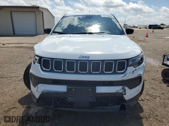 2025 Jeep Compass Sport with VIN 3C4NJDAN7ST529052, listed as a Copart auction lot 54128665 with 1,111 mi miles and Salvage title. Bid and sale history available at DreamBid. Image 5.