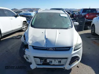 2016 Ford Escape Titanium with VIN 1FMCU0J96GUB36680, listed as a IAAI auction lot 41446705 with 137,926 mi miles. Bid and sale history available at carsss.com. Image 11.