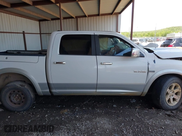 2009 Dodge 1500 Laramie z VIN 1D3HV13TX9J519720, wystawiony jako IAAI lot #42055968 z przebiegiem 190 226 mil mil oraz . Historia ofert i sprzedaży dostępna na DreamBid. Obrazek 13.