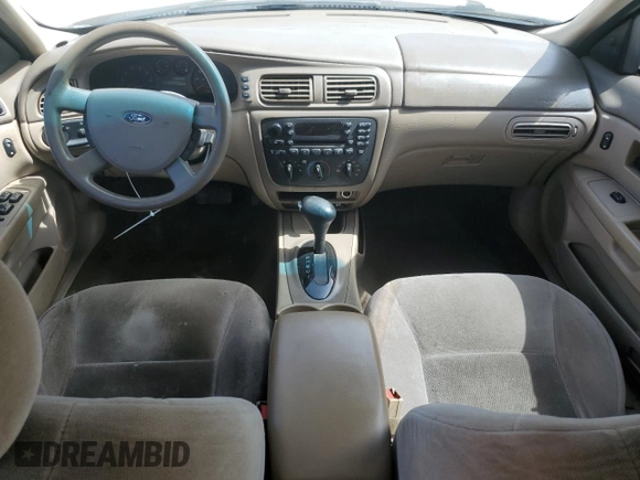 2007 Ford Taurus SE with VIN 1FAFP53U17A151246, listed as a Copart auction lot 60221955 with 284,321 mi miles and Salvage title. Bid and sale history available at DreamBid. Image 8.