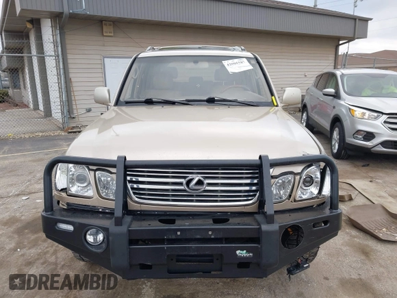 1999 Lexus LX 470 z VIN JT6HT00W8X0045705, wystawiony jako IAAI lot #42005587 z przebiegiem 443 758 mil mil oraz . Historia ofert i sprzedaży dostępna na DreamBid. Obrazek 12.