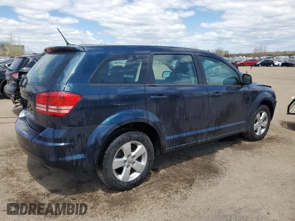 2013 Dodge Journey SE z VIN 3C4PDCAB3DT505527, wystawiony jako Copart lot #56102425 z przebiegiem 217 130 mil mil oraz Szkoda całkowita • Salvage title. Historia ofert i sprzedaży dostępna na DreamBid. Obrazek 3.