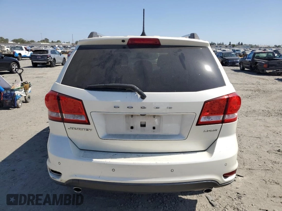 2013 Dodge Journey Crew with VIN 3C4PDCDG5DT668803, listed as a Copart auction lot 61931035 with 121,173 mi miles and Salvage title. Bid and sale history available at DreamBid. Image 6.