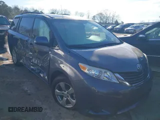 2014 Toyota Sienna LE AAS with VIN 5TDKK3DC8ES498784, listed as a IAAI auction lot 41399536 with 164,350 mi miles. Bid and sale history available at carsss.com. Image 1.