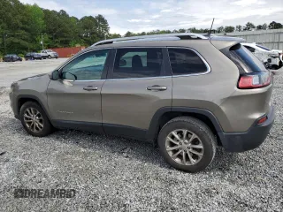 2019 Jeep Cherokee Latitude z VIN 1C4PJLCX5KD148002, wystawiony jako Copart lot #54170595 z przebiegiem 136 852 mil mil oraz Szkoda całkowita • Salvage title. Historia ofert i sprzedaży dostępna na DreamBid. Obrazek 2.