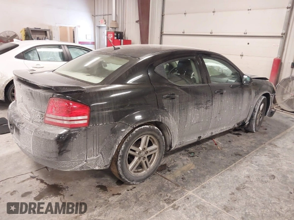 2010 Dodge Avenger R/T with VIN 1B3CC5FB0AN129498, listed as a IAAI auction lot 41626357 with 182,104 mi miles. Bid and sale history available at carsss.com. Image 4.