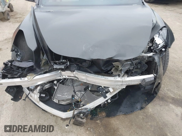 2019 Tesla Model 3 Mid Range with VIN 5YJ3E1EA8KF538083, listed as a IAAI auction lot 41891458 with 46,958 mi miles and . Bid and sale history available at carsss.com. Image 6.