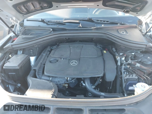 2015 Mercedes-Benz M 350 with VIN 4JGDA5JB9FA561582, listed as a IAAI auction lot 41687386 with 96,784 mi miles and . Bid and sale history available at DreamBid. Image 10.