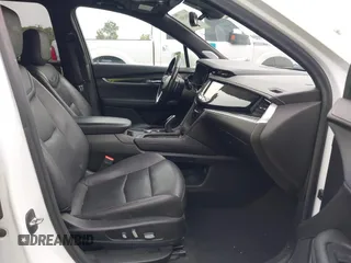 2020 Cadillac XT6 AWD Sport with VIN 1GYKPGRS3LZ109757, listed as a IAAI auction lot 42591551 with 147,241 mi miles and . Bid and sale history available at DreamBid. Image 5.
