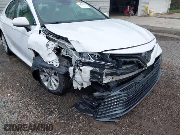 2019 Toyota Camry LE z VIN 4T1B11HK8KU819721, wystawiony jako IAAI lot #42127411 z przebiegiem 101 333 mil mil oraz . Historia ofert i sprzedaży dostępna na DreamBid. Obrazek 6.