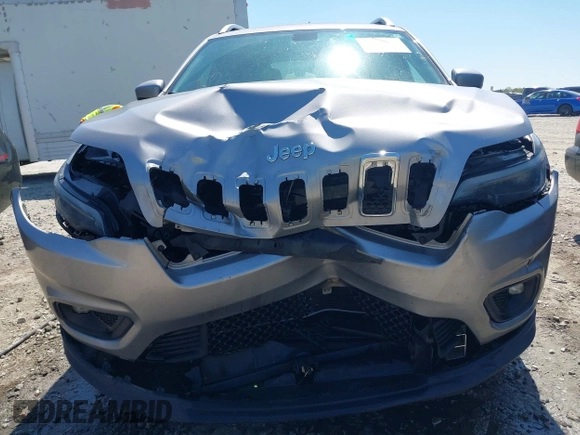 2019 Jeep Cherokee Latitude with VIN 1C4PJLCB3KD206922, listed as a IAAI auction lot 41904629 with 84,665 mi miles. Bid and sale history available at carsss.com. Image 6.
