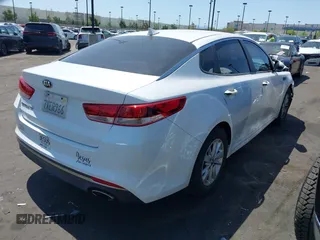 2016 Kia Optima LX with VIN 5XXGT4L37GG121295, listed as a IAAI auction lot 41922348 with 82,238 mi miles. Bid and sale history available at carsss.com. Image 4.