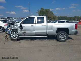 2016 Chevrolet Silverado 1500 LT with VIN 1GCRCREC3GZ119267, listed as a IAAI auction lot 40692574 with 136,704 mi miles. Bid and sale history available at carsss.com. Image 13.