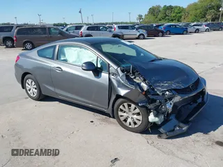 2012 Honda Civic Cpe LX with VIN 2HGFG3B56CH509429, listed as a IAAI auction lot 41780209 with 126,974 mi miles. Bid and sale history available at carsss.com. Image 1.