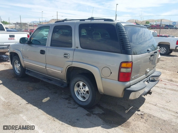 2000 Chevrolet New Tahoe LT with VIN 1GNEK13T7YJ185916, listed as a IAAI auction lot 42109831 with 205,165 mi miles. Bid and sale history available at carsss.com. Image 3.