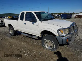 1999 Toyota Tacoma PreRunner with VIN 4TASM92N0XZ559544, listed as a Copart auction lot 86626024 with 209,794 mi miles and Salvage title. Bid and sale history available at DreamBid. Image 4.