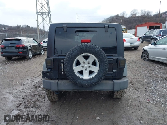 2011 Jeep Wrangler Unlimited Sport with VIN 1J4BA3H17BL552319, listed as a IAAI auction lot 41747031 with 120,751 mi miles. Bid and sale history available at carsss.com. Image 17.