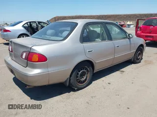 1998 Toyota Corolla VE with VIN 1NXBR18E8WZ105435, listed as a IAAI auction lot 42660562 with 295,050 mi miles and . Bid and sale history available at DreamBid. Image 4.