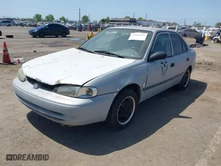 2000 Chevrolet Prizm LSi with VIN 1Y1SK5287YZ408470, listed as a IAAI auction lot 42116829 with 237,089 mi miles. Bid and sale history available at carsss.com. Image 2.