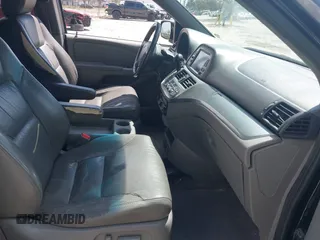 2010 Honda Odyssey EX-L with VIN 5FNRL3H79AB028724, listed as a IAAI auction lot 41687998 with 221,852 mi miles. Bid and sale history available at carsss.com. Image 5.