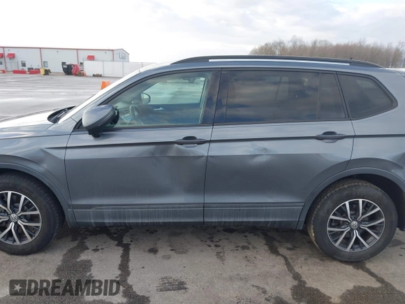 2021 Volkswagen Tiguan S with VIN 3VV1B7AX8MM016874, listed as a IAAI auction lot 41633090 with 76,857 mi miles and . Bid and sale history available at DreamBid. Image 14.