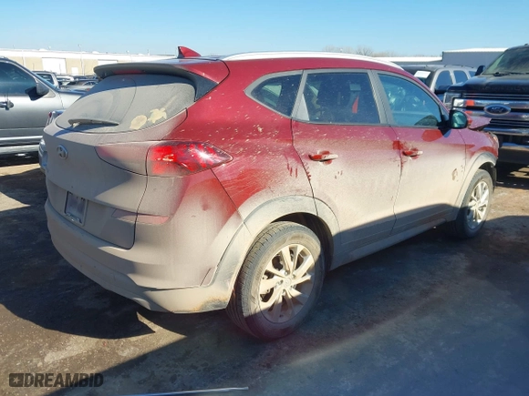 2019 Hyundai Tucson Value with VIN KM8J33A40KU077246, listed as a IAAI auction lot 41344888 with 72,259 mi miles. Bid and sale history available at carsss.com. Image 4.