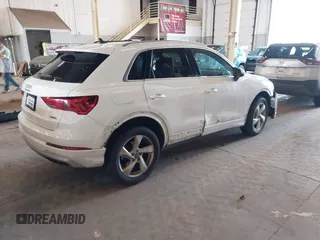 2021 Audi Q3 Premium z VIN WA1AUCF36M1089224, wystawiony jako IAAI lot #41998972 z przebiegiem 73 593 mil mil oraz . Historia ofert i sprzedaży dostępna na DreamBid. Obrazek 4.