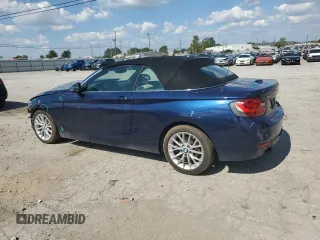 2016 BMW 2 Series 228i xDrive with VIN WBA1L9C50GV324969, listed as a Copart auction lot 72618854 with 71,300 mi miles and Salvage Title. Bid and sale history available at carsss.com. Image 2.