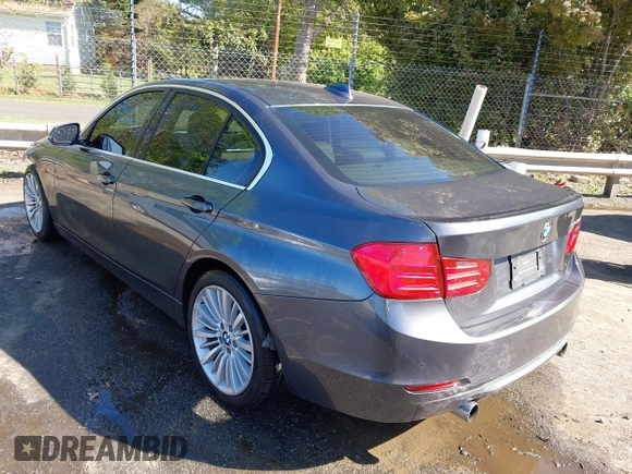 2013 BMW 3 Series ActiveHybrid 3 with VIN WBA3F9C5XDF484346, listed as a IAAI auction lot 41998341 with 145,271 mi miles. Bid and sale history available at carsss.com. Image 3.