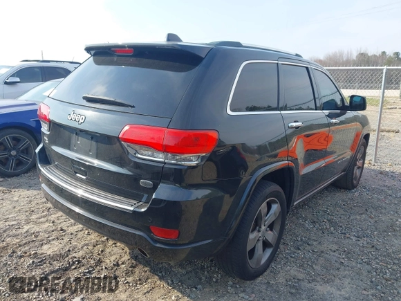 2014 Jeep Grand Cherokee Overland with VIN 1C4RJECG4EC197433, listed as a IAAI auction lot 41769932 with 198,568 mi miles. Bid and sale history available at carsss.com. Image 4.