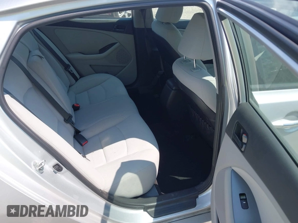 2014 Kia Optima LX with VIN 5XXGM4A76EG316577, listed as a IAAI auction lot 42594090 with 68,979 mi miles and . Bid and sale history available at DreamBid. Image 8.