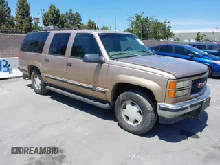 1999 GMC Suburban with VIN 3GKFK16R8XG505360, listed as a IAAI auction lot 42608229 with 211,671 mi miles and . Bid and sale history available at DreamBid. Image 1.