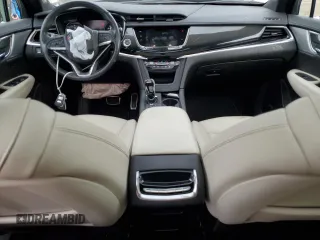 2022 Cadillac XT6 Sport with VIN 1GYKPGRS4NZ174846, listed as a Copart auction lot 64271474 with 57,891 mi miles and Salvage Title. Bid and sale history available at carsss.com. Image 8.