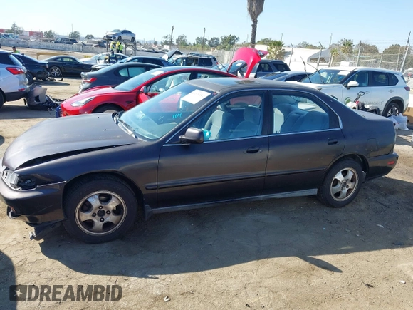 1997 Honda Accord Special Edition with VIN 1HGCD5605VA107036, listed as a IAAI auction lot 41674182 with 236,341 mi miles and . Bid and sale history available at carsss.com. Image 15.