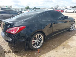2014 Hyundai Genesis Coupe Ultimate with VIN KMHHU6KJ1EU120076, listed as a IAAI auction lot 42373762 with 100,537 mi miles and . Bid and sale history available at DreamBid. Image 4.