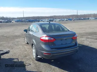 2015 Ford Fiesta SE z VIN 3FADP4BJ5FM219915, wystawiony jako IAAI lot #41725718 z przebiegiem 153 136 mil mil oraz . Historia ofert i sprzedaży dostępna na DreamBid. Obrazek 3.