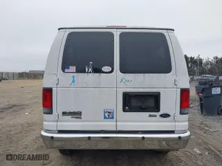 2010 Ford Econoline Wagon XL with VIN 1FBNE3BL2ADA77919, listed as a IAAI auction lot 41522274 with 141,286 mi miles. Bid and sale history available at carsss.com. Image 16.