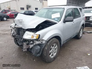 2011 Mazda Tribute Sport with VIN 4F2CY9C7XBKM01050, listed as a IAAI auction lot 41433870 with 122,287 mi miles. Bid and sale history available at carsss.com. Image 17.
