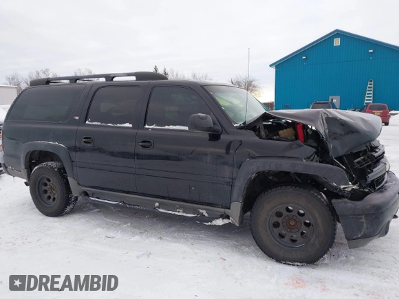 2005 Chevrolet Suburban Z71 with VIN 3GNFK16ZX5G284585, listed as a IAAI auction lot 41588062 with 212,848 mi miles. Bid and sale history available at carsss.com. Image 13.