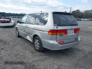 2004 Honda Odyssey EX with VIN 5FNRL18694B118357, listed as a IAAI auction lot 41508682 with 169,017 mi miles and . Bid and sale history available at DreamBid. Image 3.